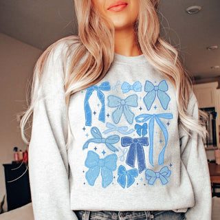 Winter Blue Bow Collage Wholesale Graphic Sweatshirt - Fast Shipping - Limeberry Wholesale